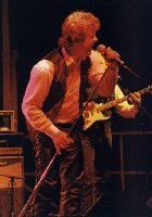 Sänger, Bluesharpspieler undheimlicher Bandleader THOMAS (TOM) Langer